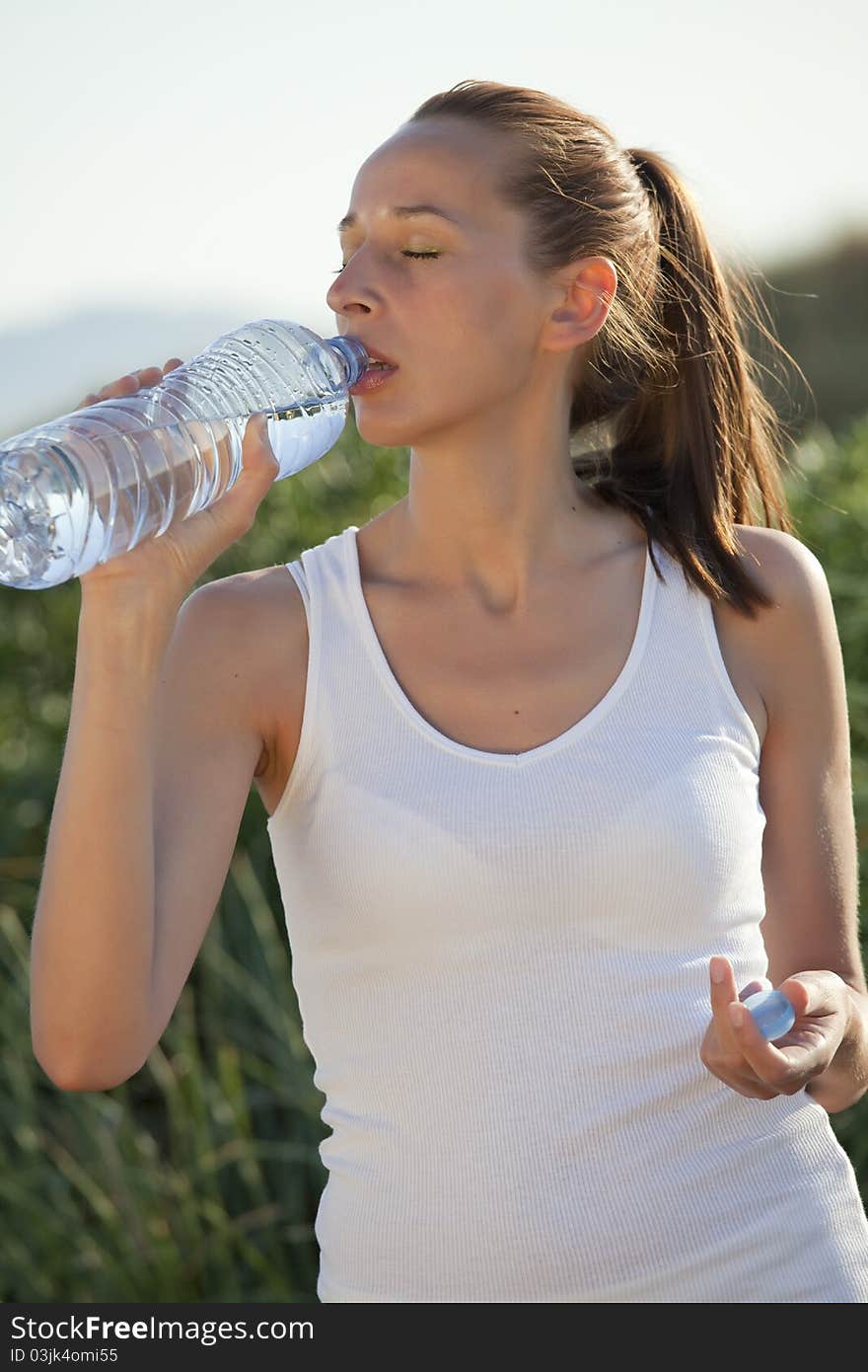 Fitness Woman Drinking Water