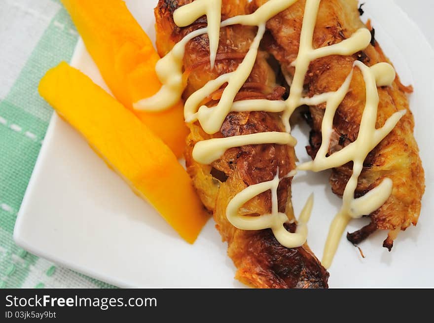 Closeup of unique vegetarian dish of mayo coated fried seafood. Closeup of unique vegetarian dish of mayo coated fried seafood.