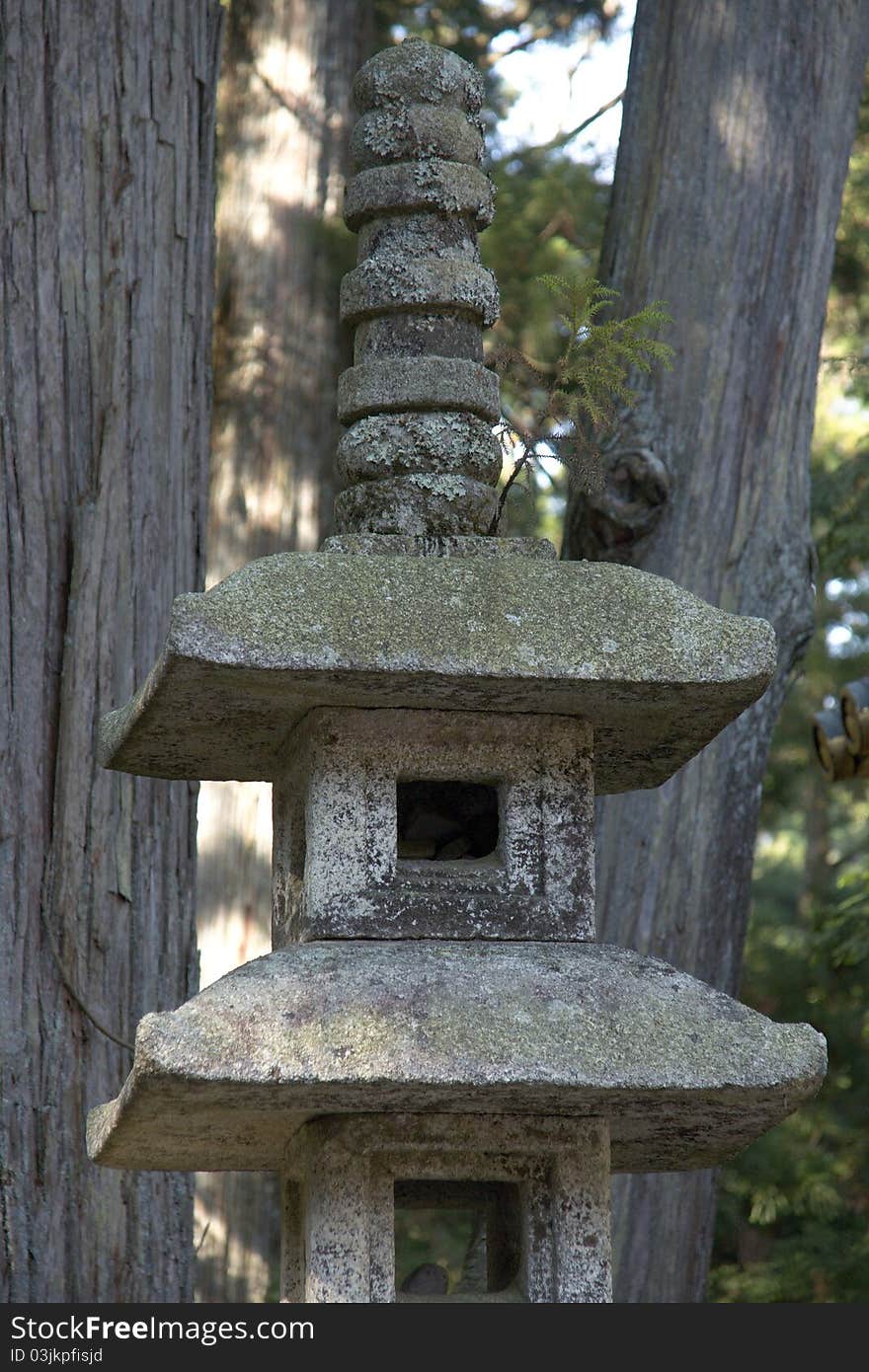 Mausoleums of the Tokugawa Shoguns in nikko at autumn with red leaves