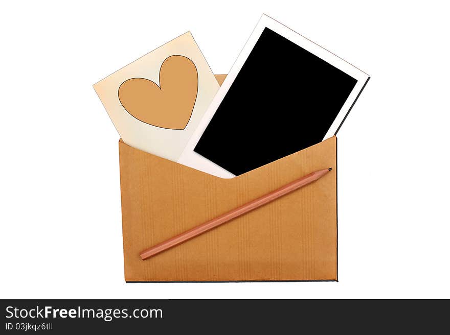 A vintage envelope with photo and heart on white background