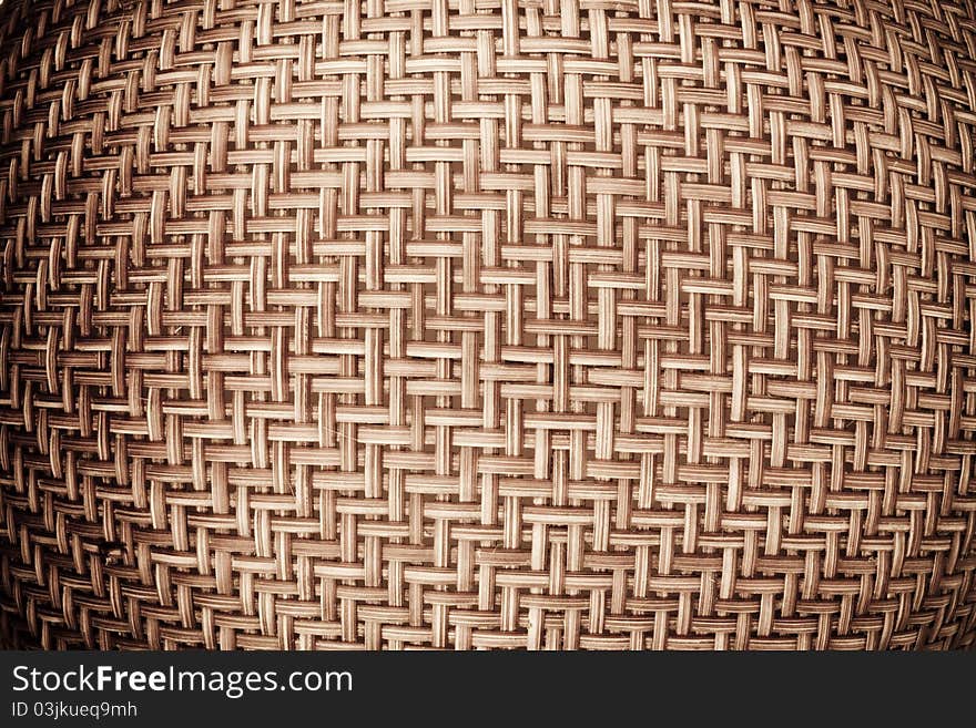 A close-up texture of rattan basket. A close-up texture of rattan basket.