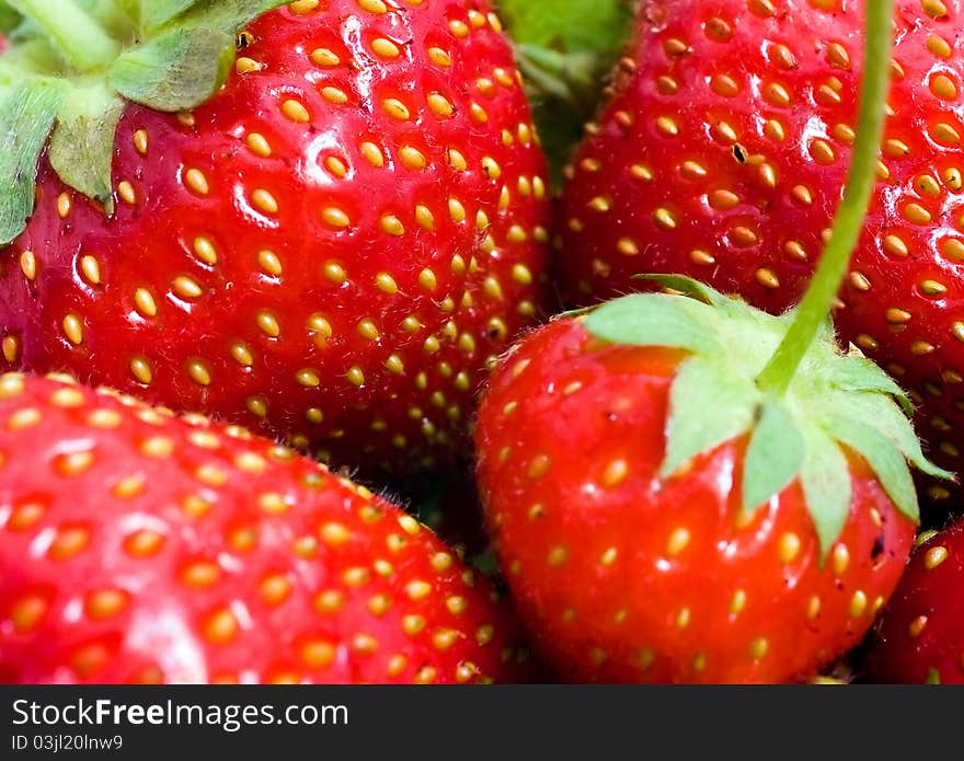 Detail of fresh strawberries in the basket.