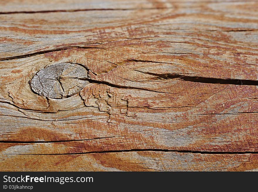 A piece of wood with the top out of focus for copyspace