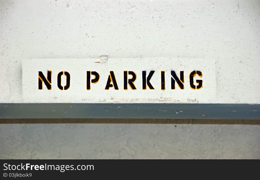 No Parking Sign Painted in Parking Garage