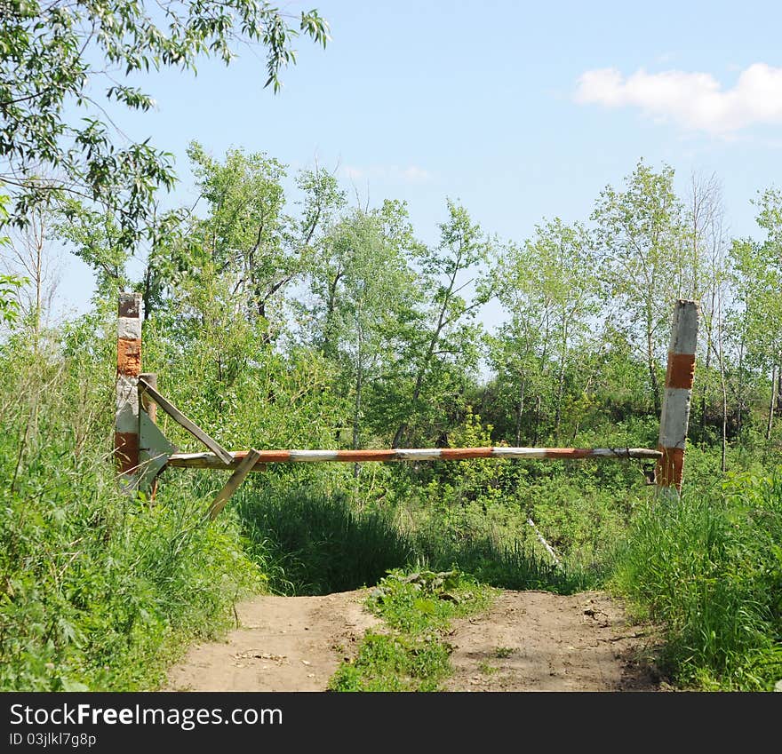 Old road with forbidden access