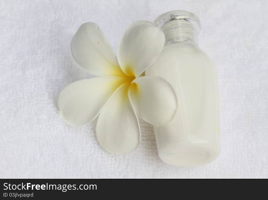 Spa collection ,Plumeria flower and white towel. Spa collection ,Plumeria flower and white towel