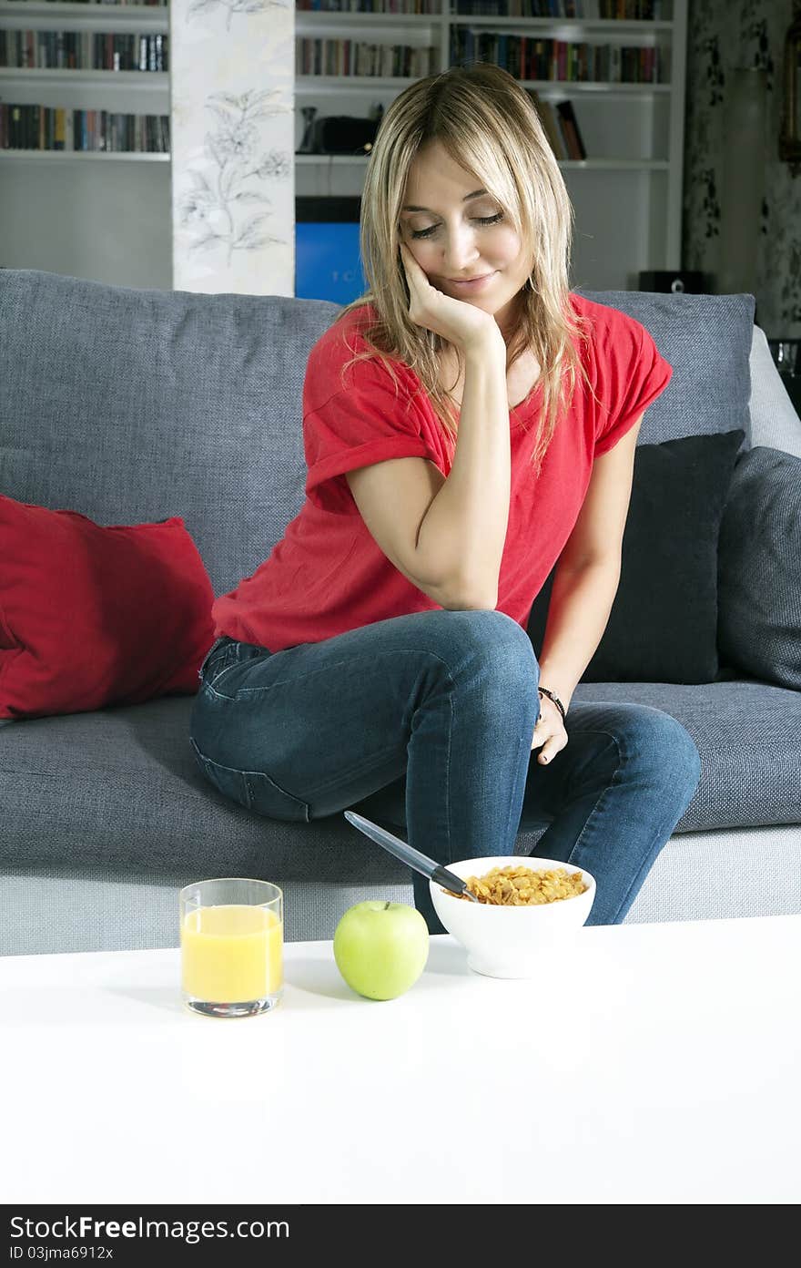 Beautiful blond woman having a healthy breakfast. Beautiful blond woman having a healthy breakfast