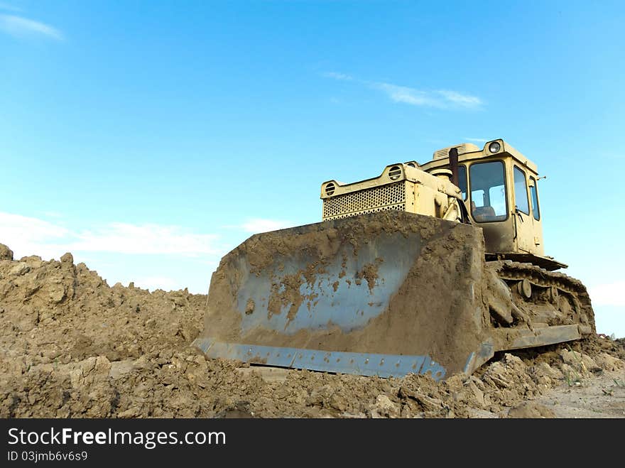 Digger, Heavy Duty construction equipment parked at work site