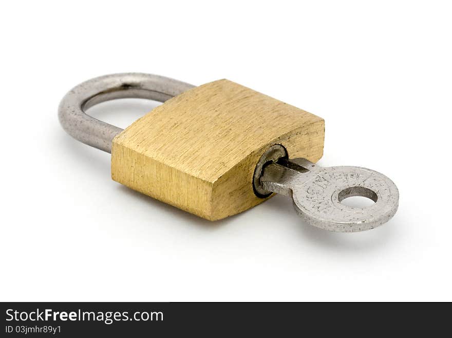 Padlock and key over white