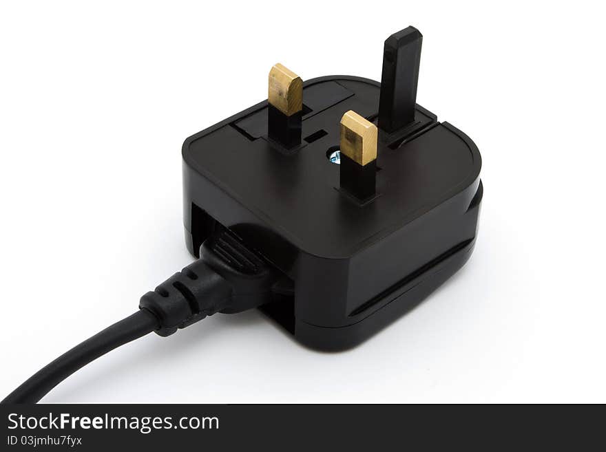 Black UK plug over white