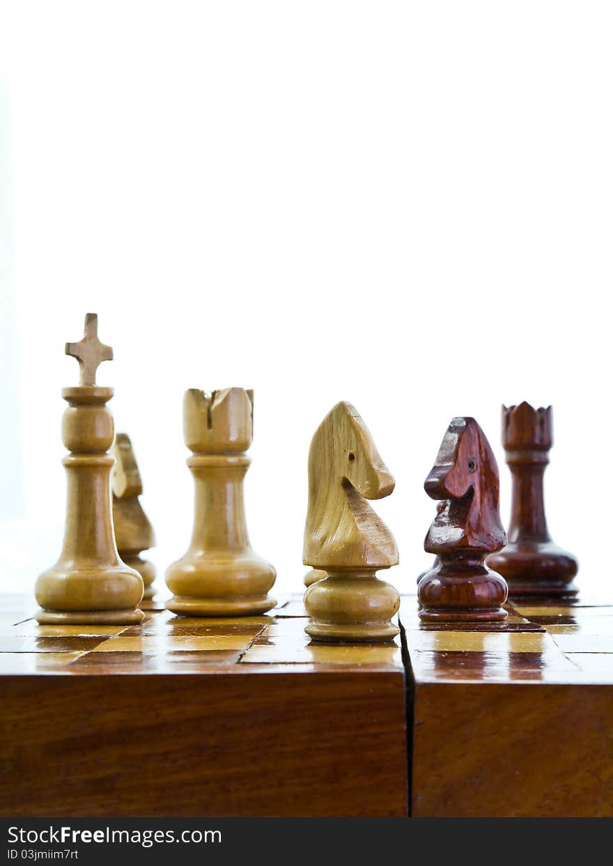 Wooden chess on white background. Wooden chess on white background