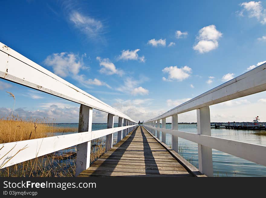 A pier with blue sky in Germany.