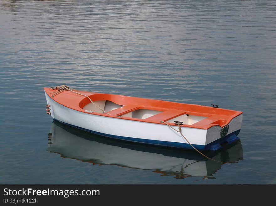 Red, withe and blue Boat