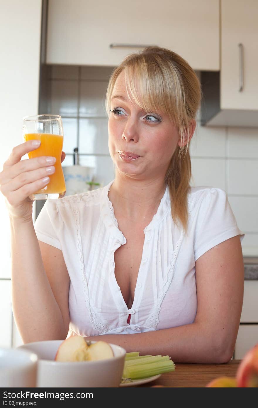 Young Blond Woman With Her Breakfast