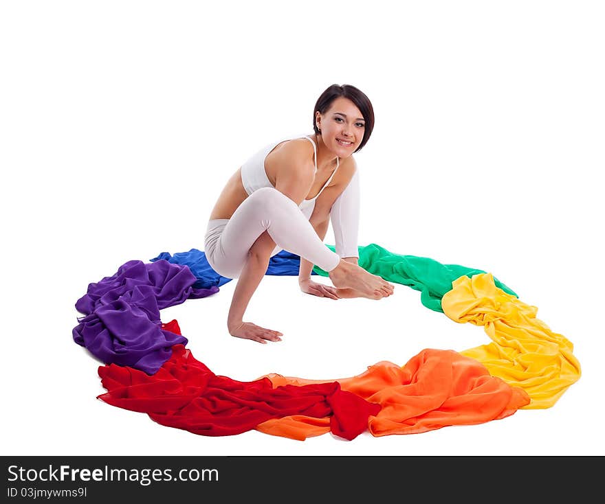 Woman doing yoga exercise - rainbow color ring