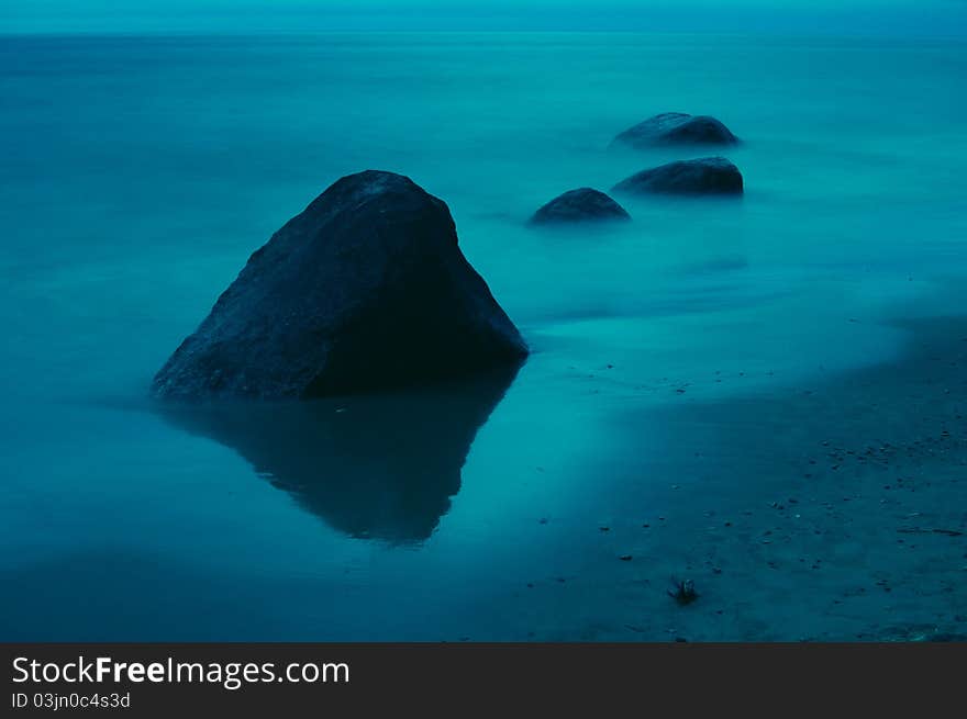 Stones in white night