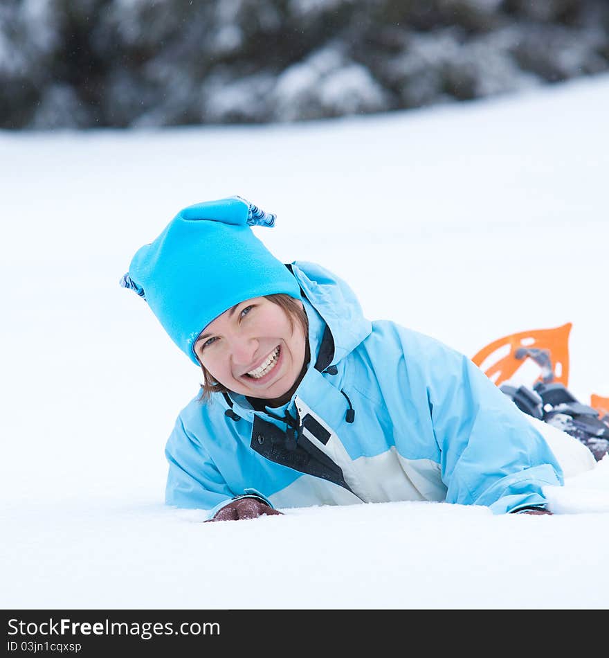 Portrait of the hiker lying in snow. Portrait of the hiker lying in snow