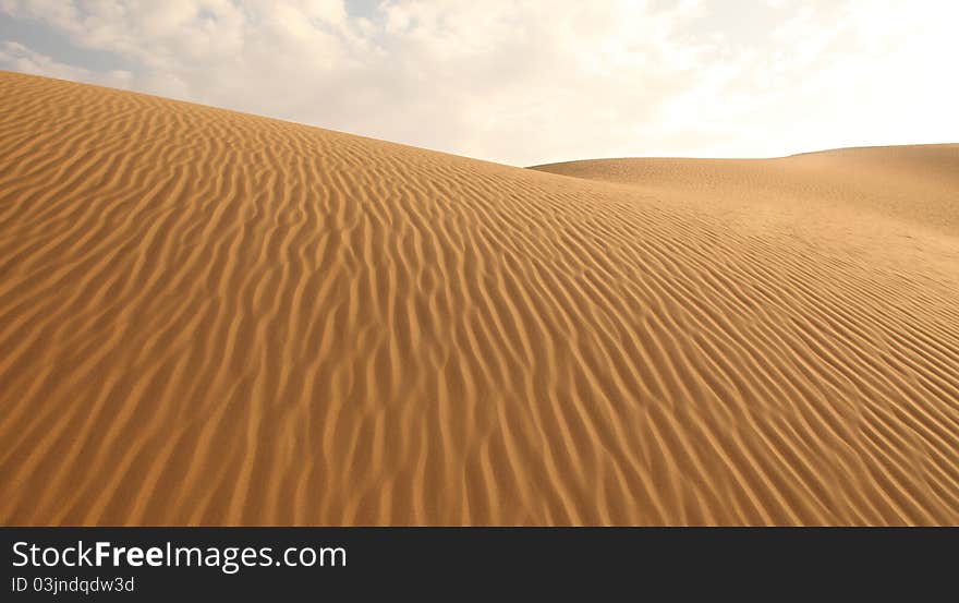 Sand dunes and cloudless sky