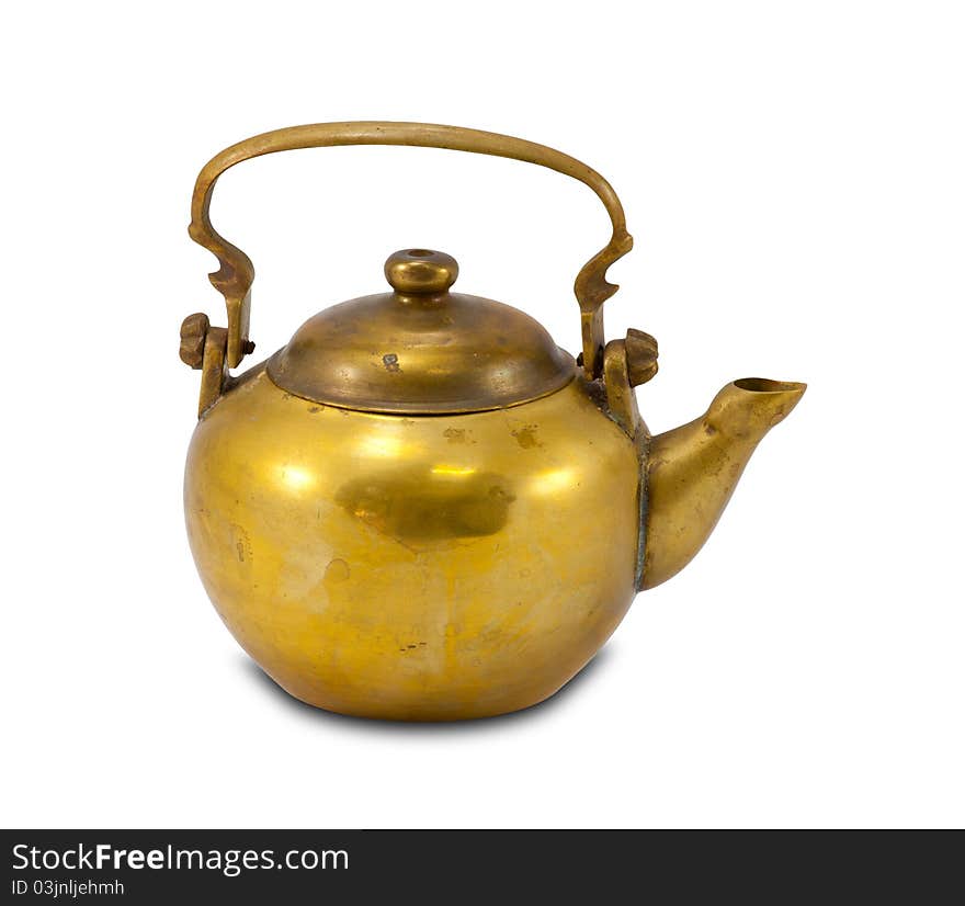 Old gold teapot isolated on the white background