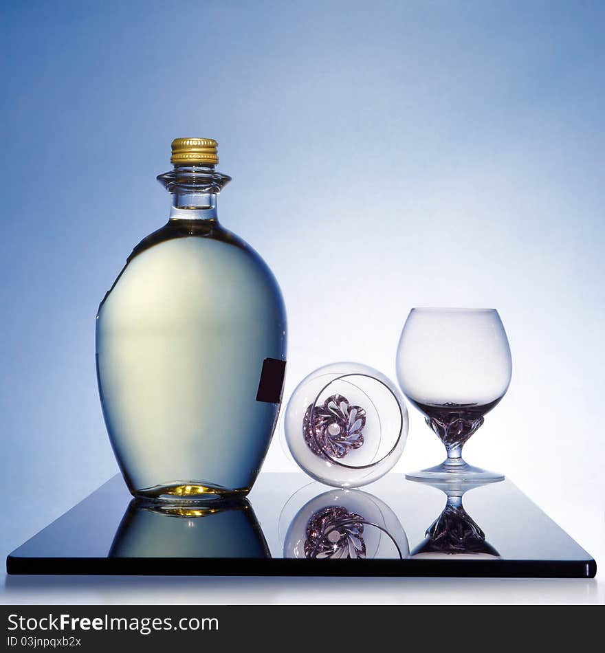 Glasses - wine bottle, goblets and plate