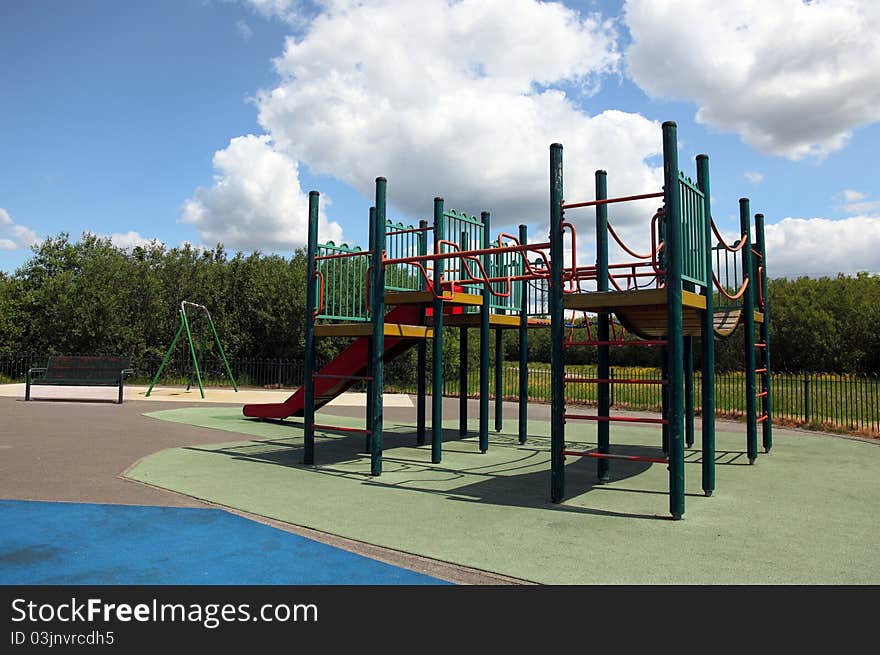 A colorful children playground on park. A colorful children playground on park