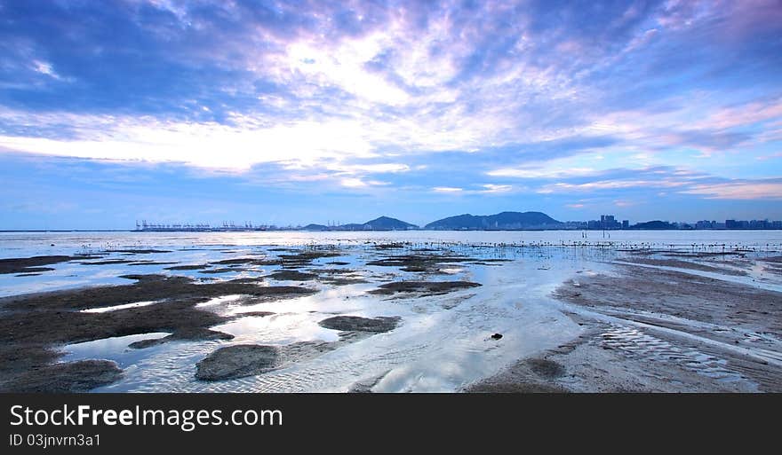 It is taken along the seashore facing the factories in Shenzhen. It is taken along the seashore facing the factories in Shenzhen.