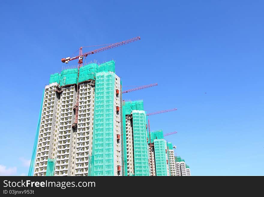 Construction site with crane and building