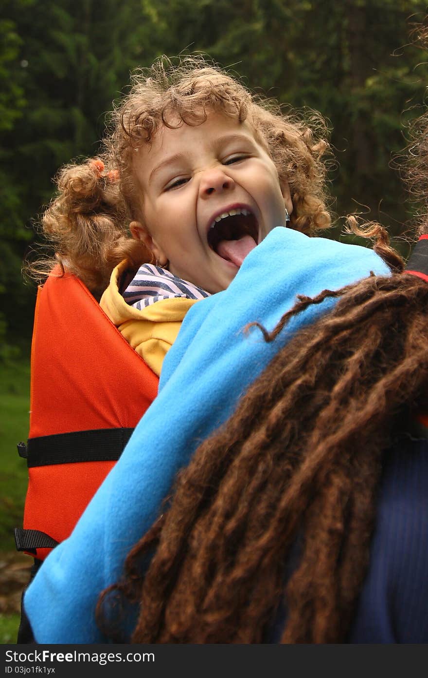 Happy child hiking with dad