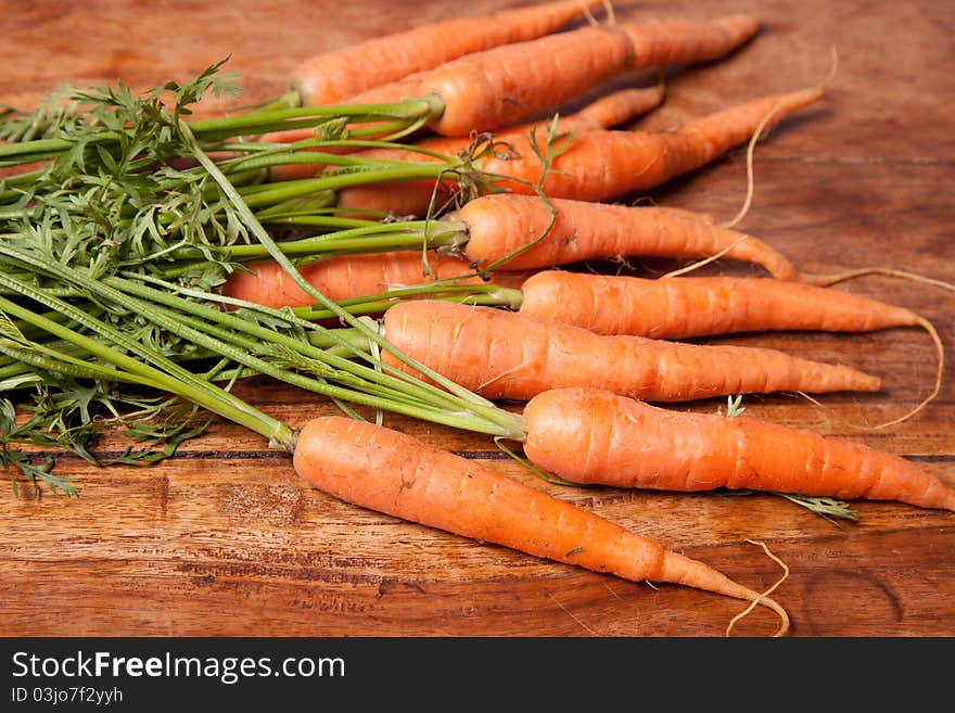 Fresh loose carrots on the table