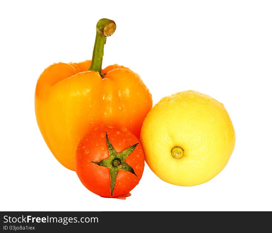 Pepper,tomatoe and lemon isolated on a white background. Pepper,tomatoe and lemon isolated on a white background