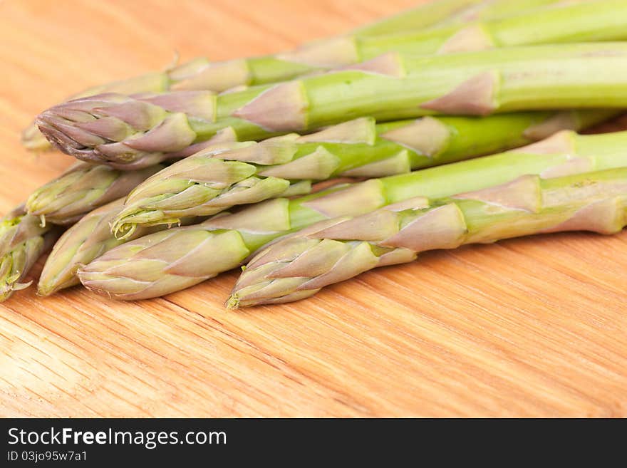 Asparagus On The Wooden Board