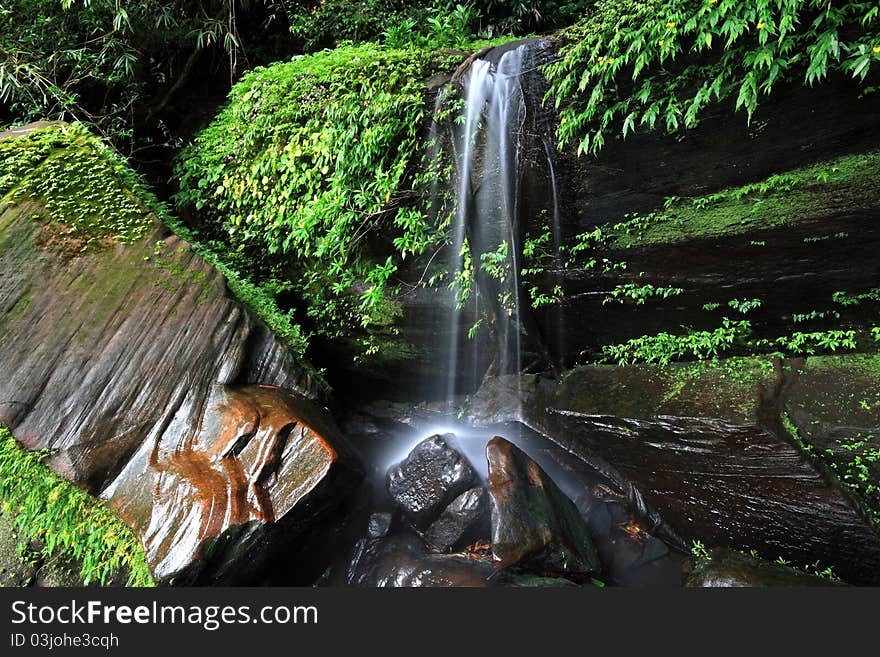 Beautiful and peaceful waterfall in the nature