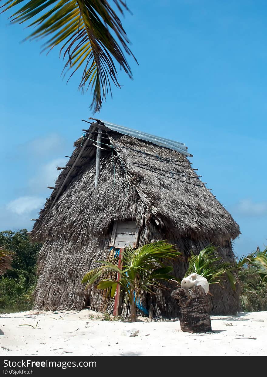 Coconut palm leaves hut on the caribbean beach. Coconut palm leaves hut on the caribbean beach.