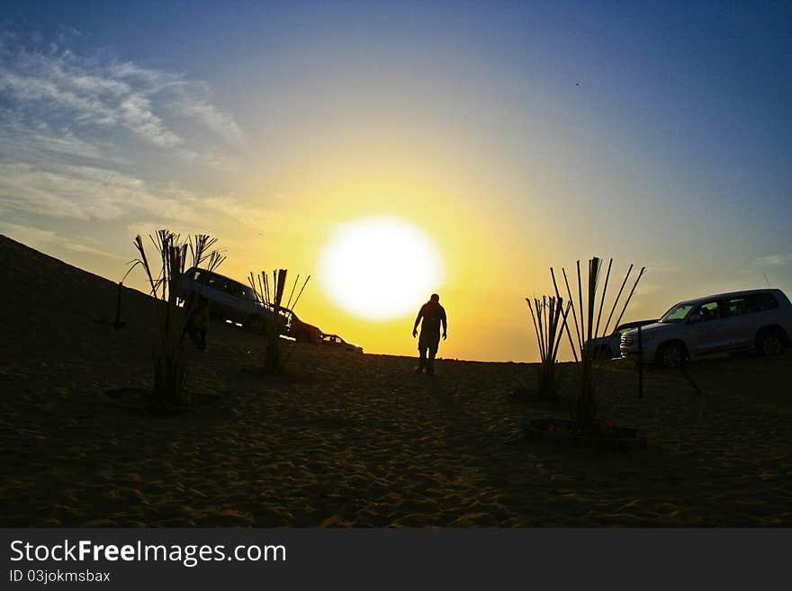 A view of a desert's sunset in Dubai. A view of a desert's sunset in Dubai.