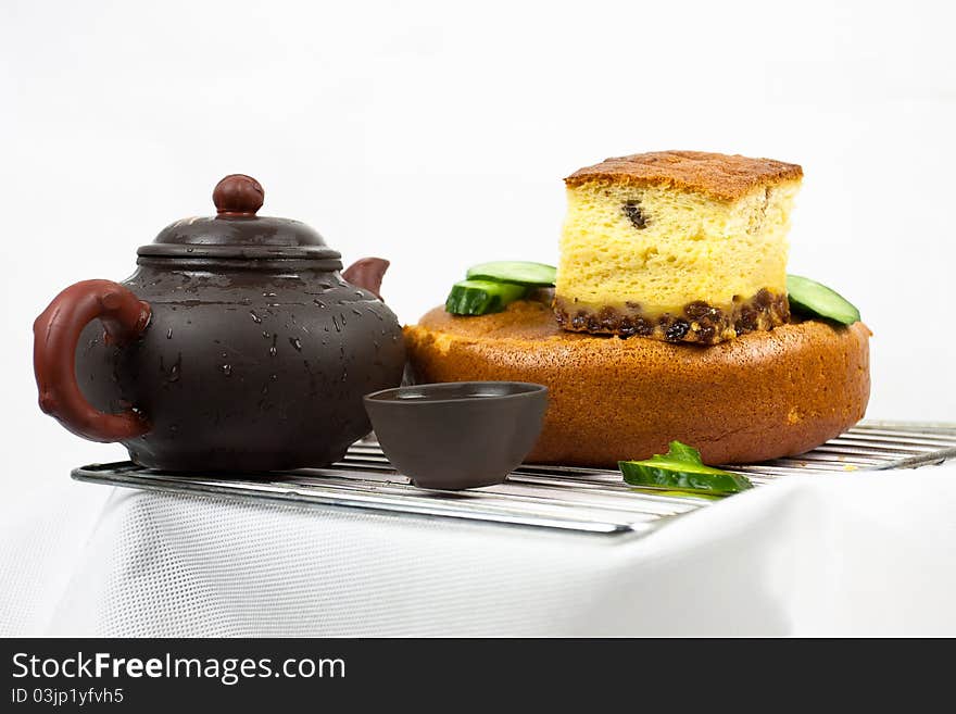 Cake,teapot and cucumbers