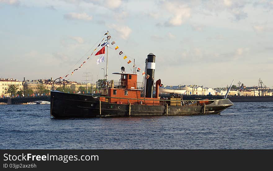 The retro boat moored in the Neva River delta (St Petersburg). The retro boat moored in the Neva River delta (St Petersburg)