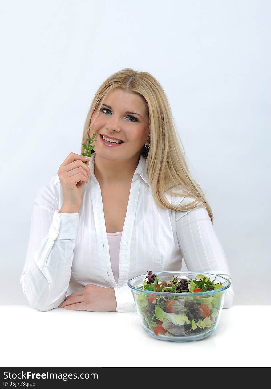 Casual Woman Eating Healthy Green Vegetable Salad