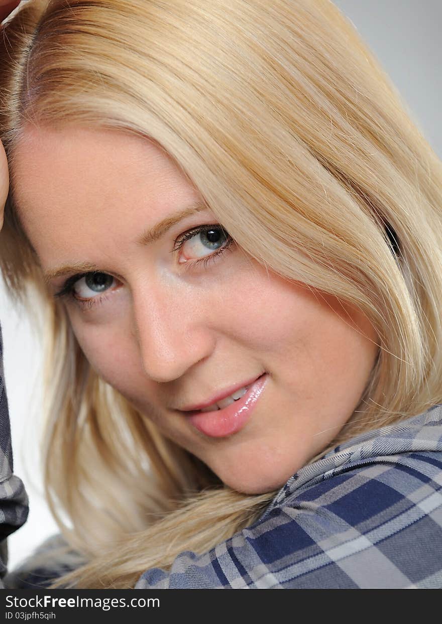 Portrait of young pretty smiling woman