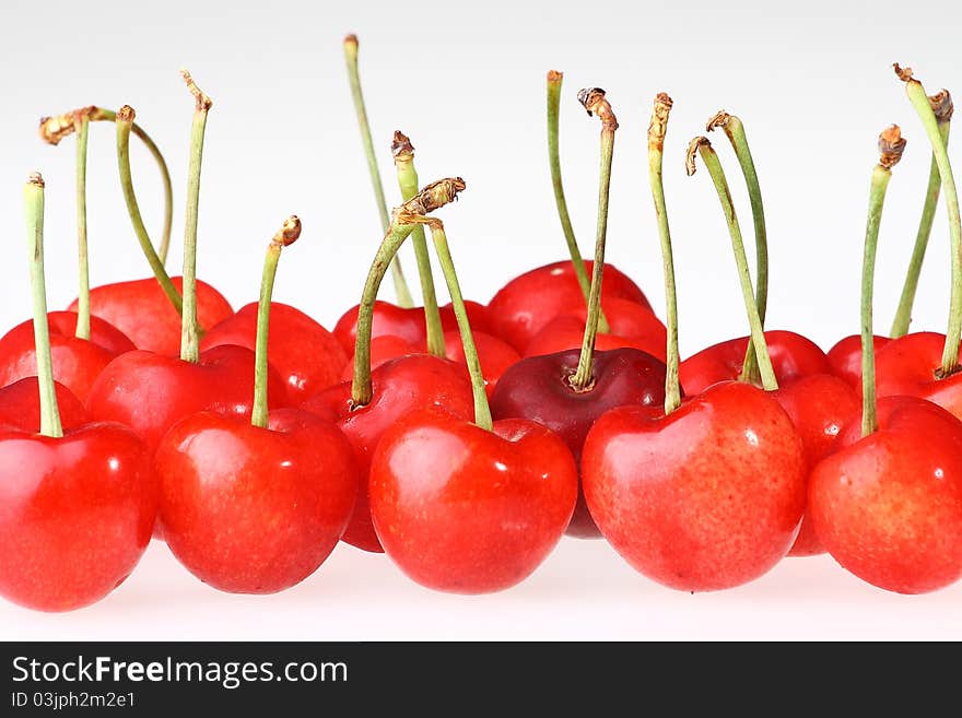 Cherries with Dewdrops on White Background