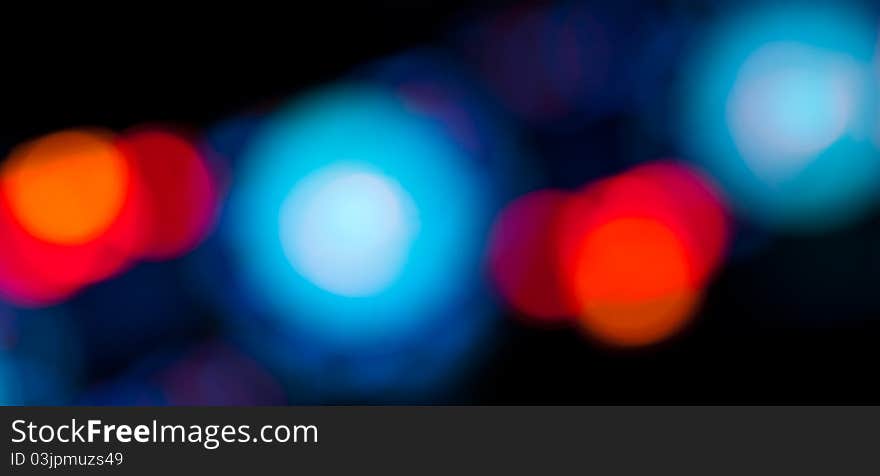 Dark Bokeh Background with red and blue lights