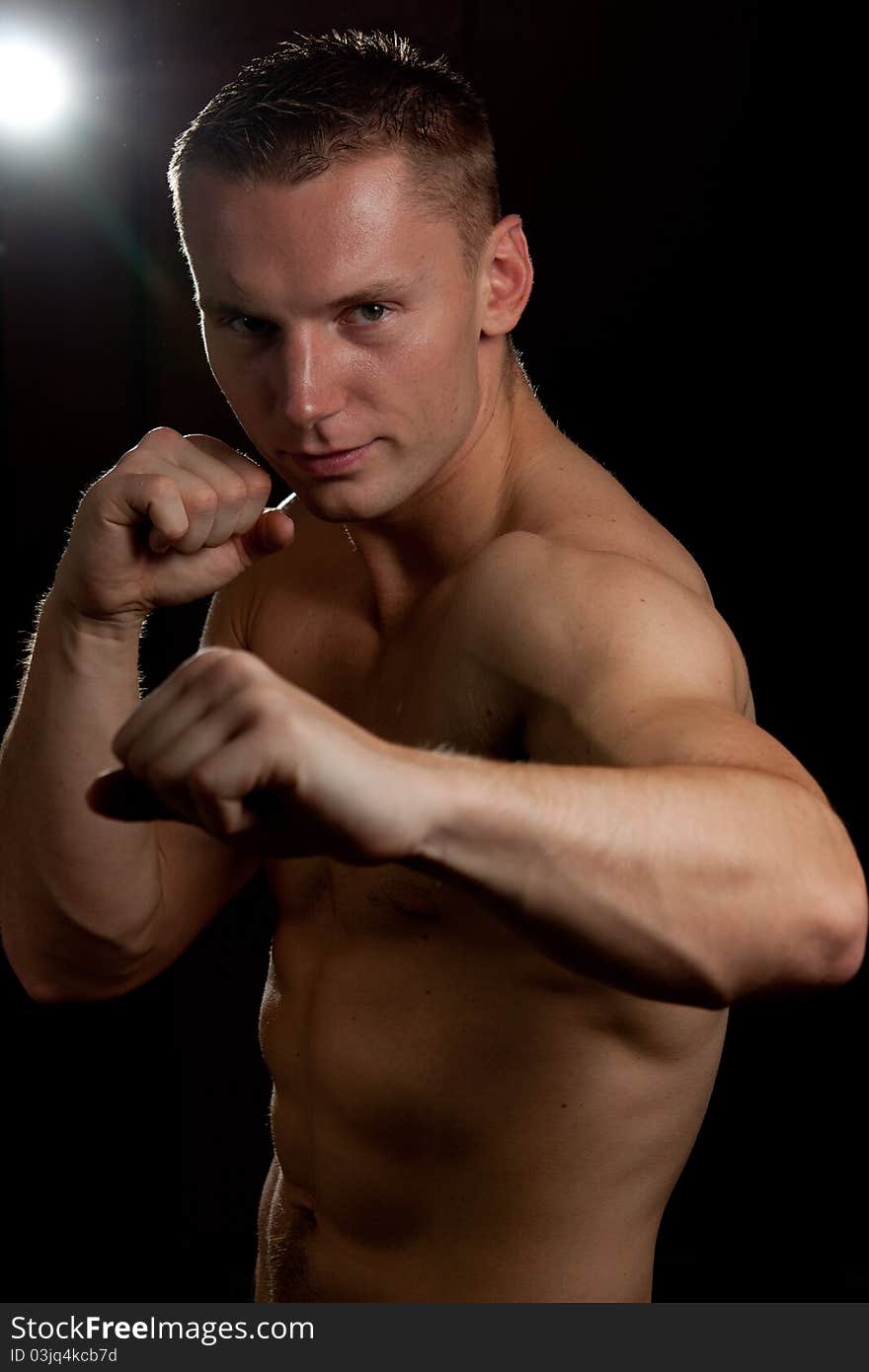 Sexy male boxer ready to fight