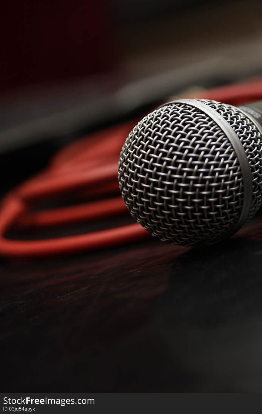 An close up picture of an microphone. An close up picture of an microphone