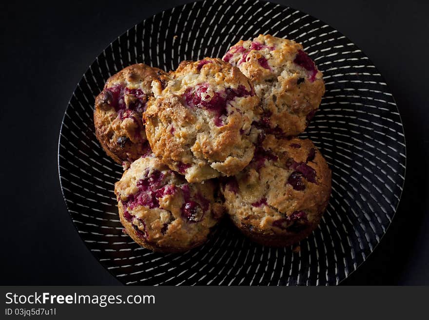 Freshly baked cranberry oat muffins with walnuts