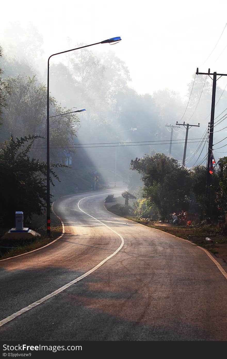 Asphalt roadway in the fog