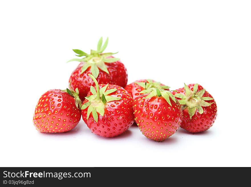 Sweet red strawberries isolated on white background