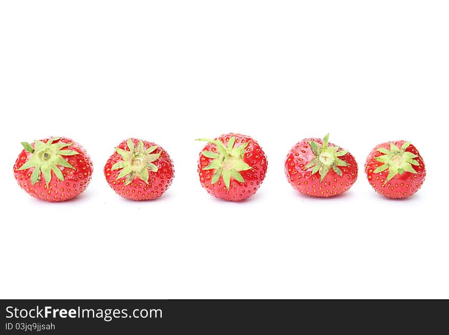 Sweet red strawberries isolated on white background