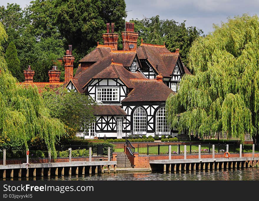 Timber Framed House and garden on the Banks of the River Thames in England. Timber Framed House and garden on the Banks of the River Thames in England