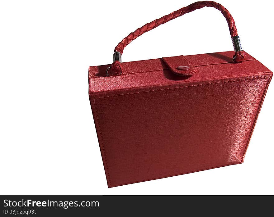 Isolated red make-up bag.