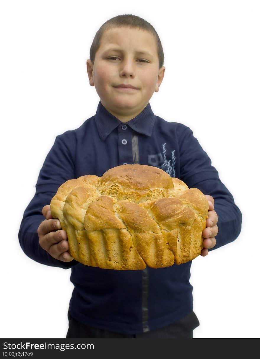 Loaf of  bread in a child's hands