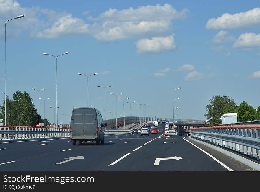 Road bridge car way clouds sky. Road bridge car way clouds sky